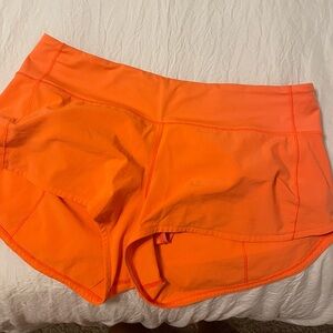 Neon orange lulu shorts